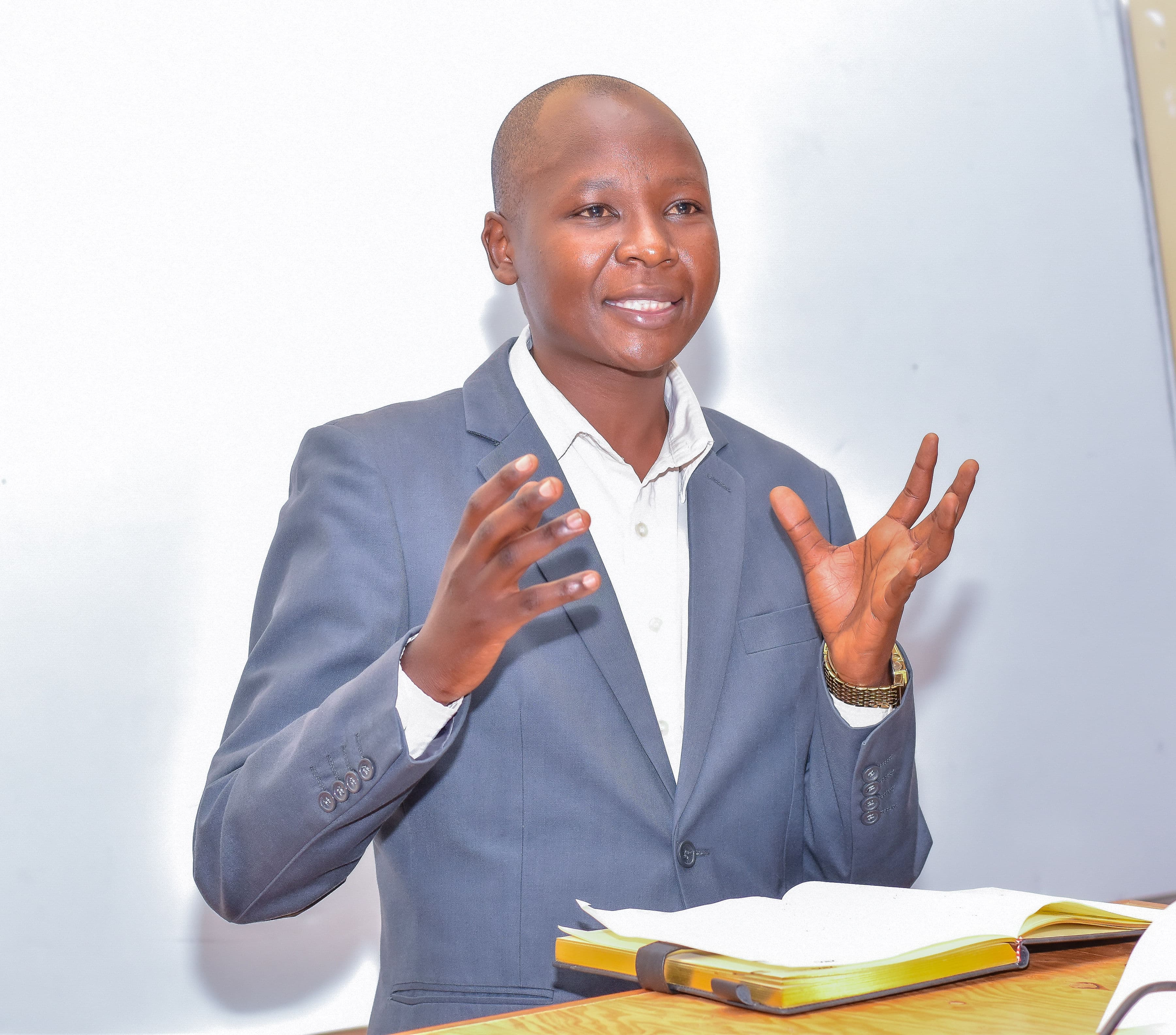 Representative from the CoD of Kirinyaga University sharing opening remarks.