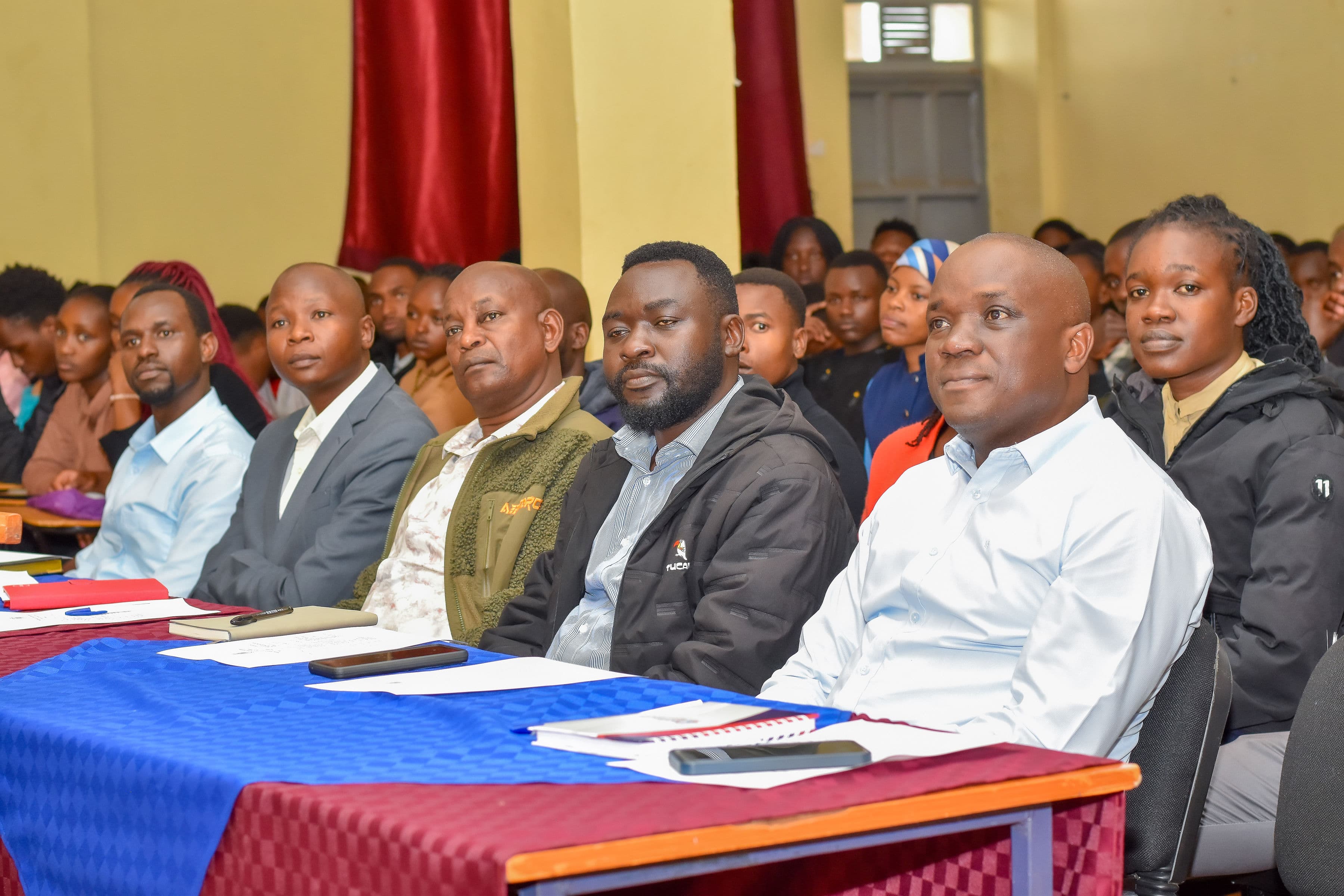 Attendees following the proceedings with keen interest.