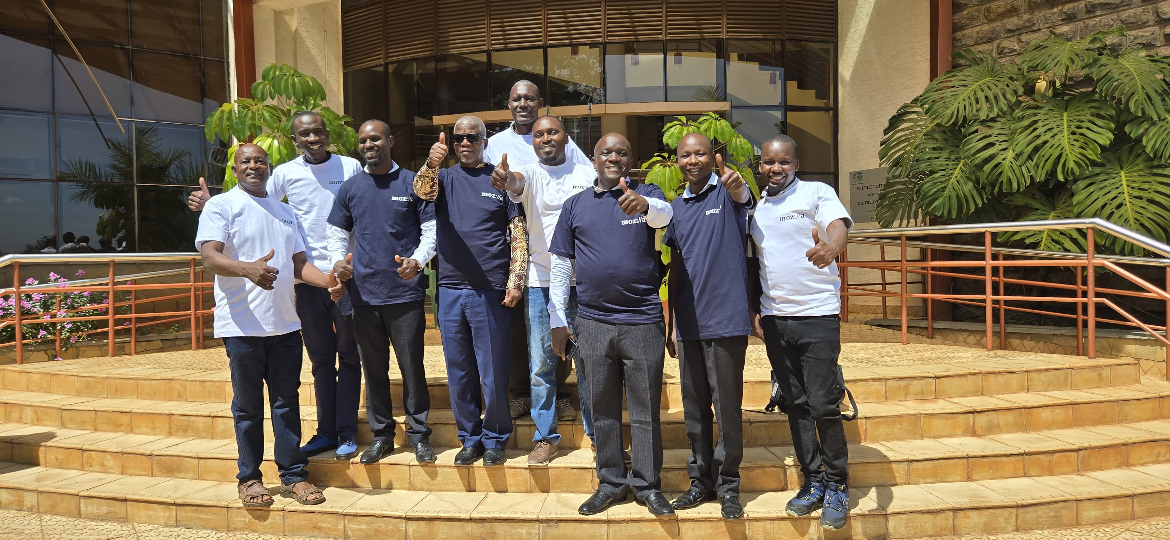 DVC Prof. Charles Omwandho and faculty attendees celebrating the success of the responsible computing animation initiative.